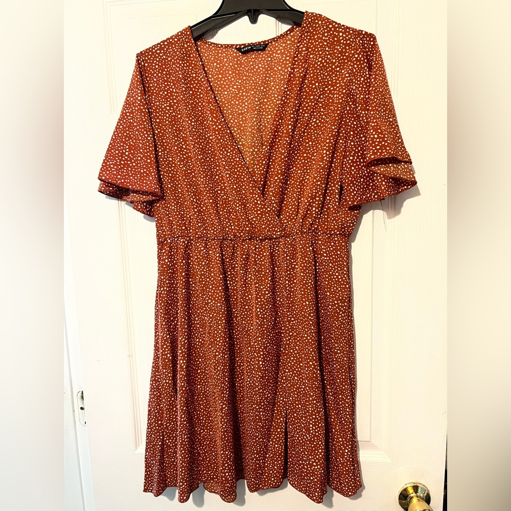 Never worn, orange rust with white dot sun dress.